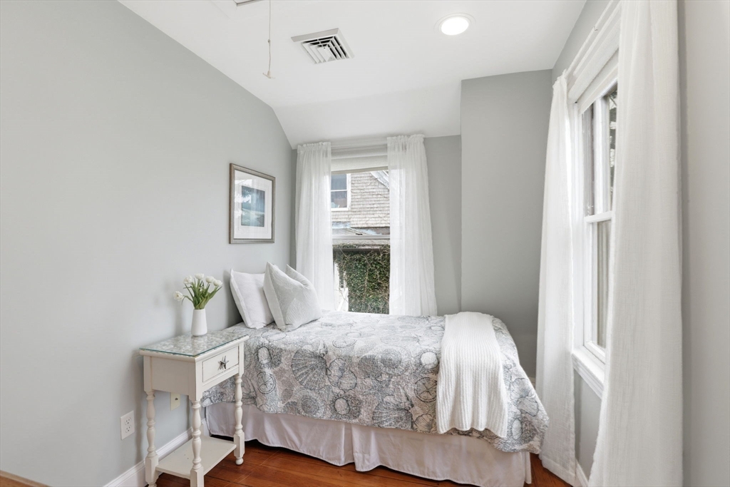 60 Holbrook Avenue Hull, MA 02045 - Photo 22 of 37 a bedroom with a bed and window