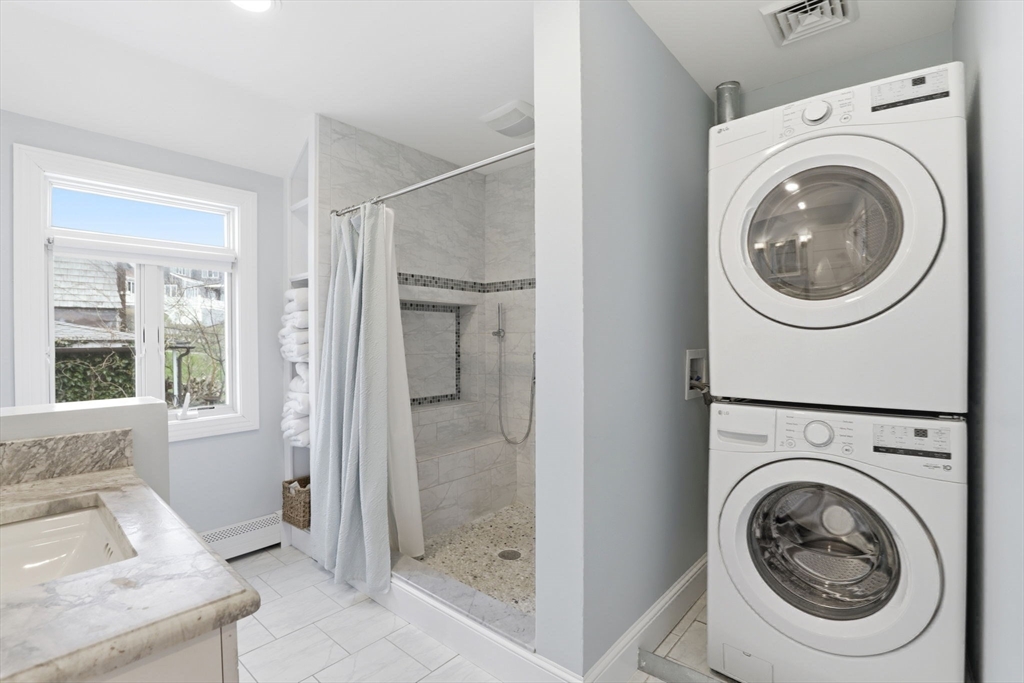 60 Holbrook Avenue Hull, MA 02045 - Photo 23 of 37 a view of a bathroom with washing machine and sink
