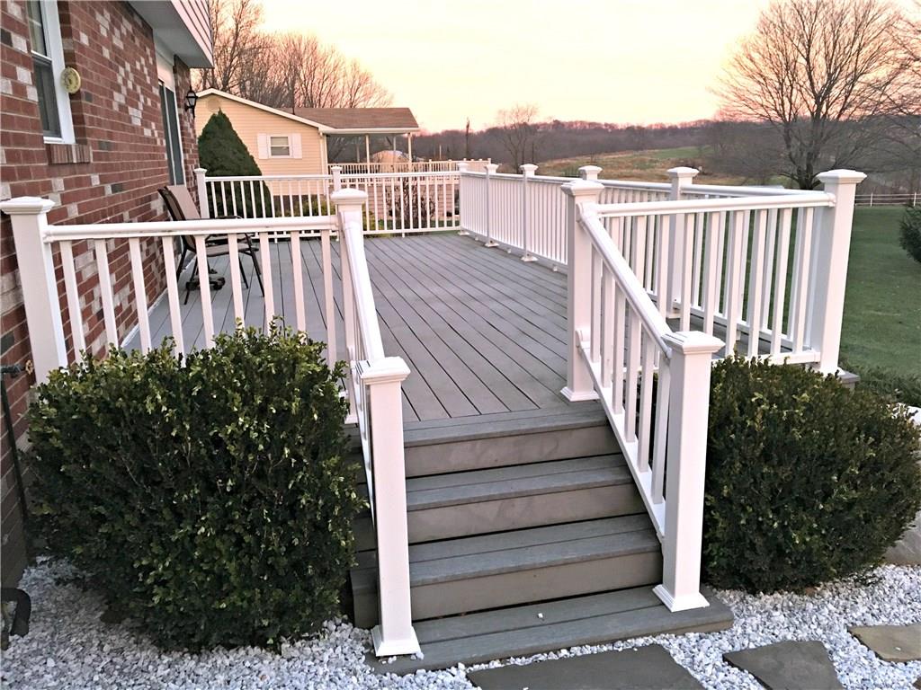 301 Wilson Road Clinton, PA 15026 - Photo 20 of 25 Fantastic 30' composite deck...nature watch, enjoy the sunrise/sunsets, relax, entertain...