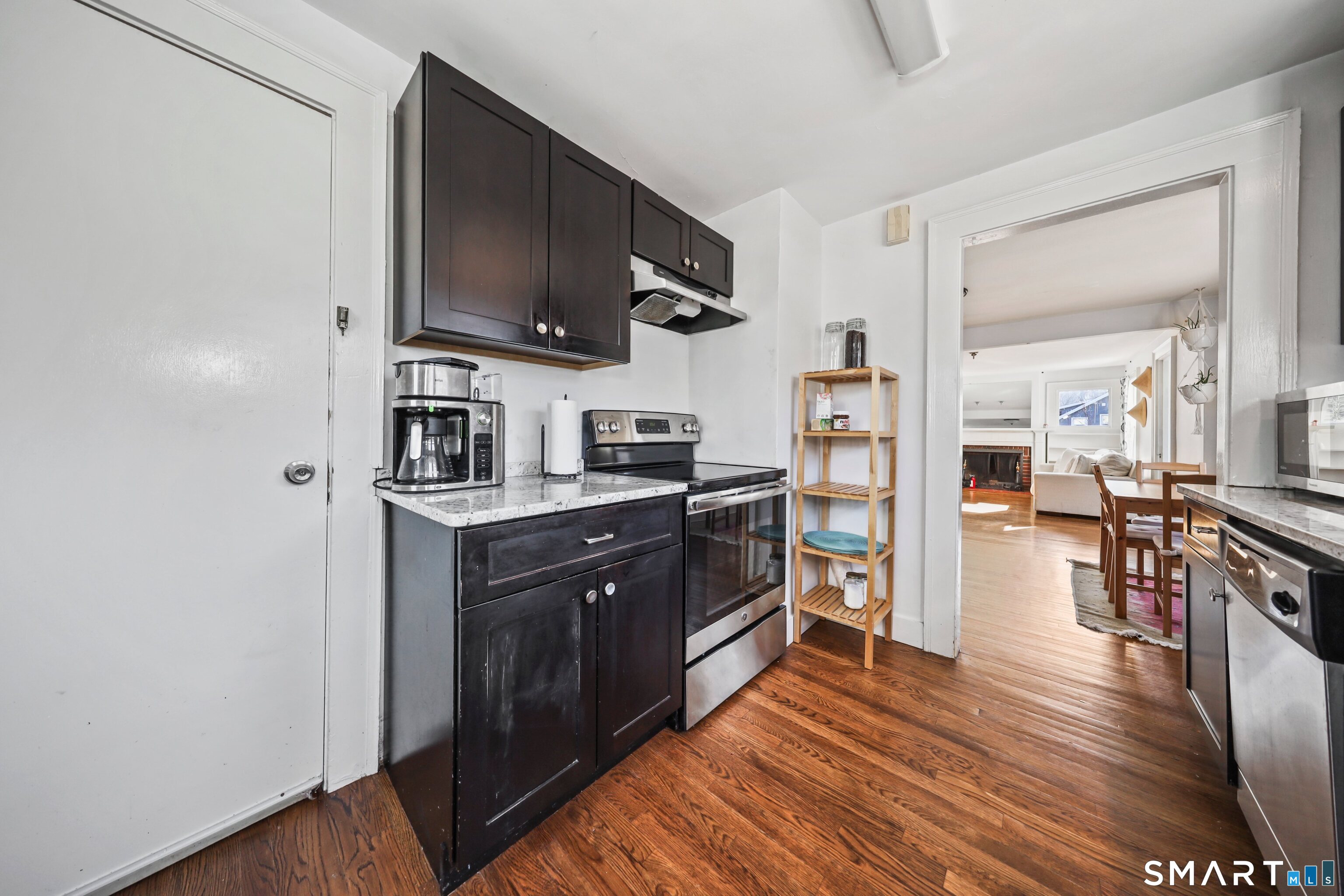 196 Waite Street Hamden, CT 06517 - Photo 5 of 15 a kitchen with stainless steel appliances granite countertop a refrigerator and a stove top oven