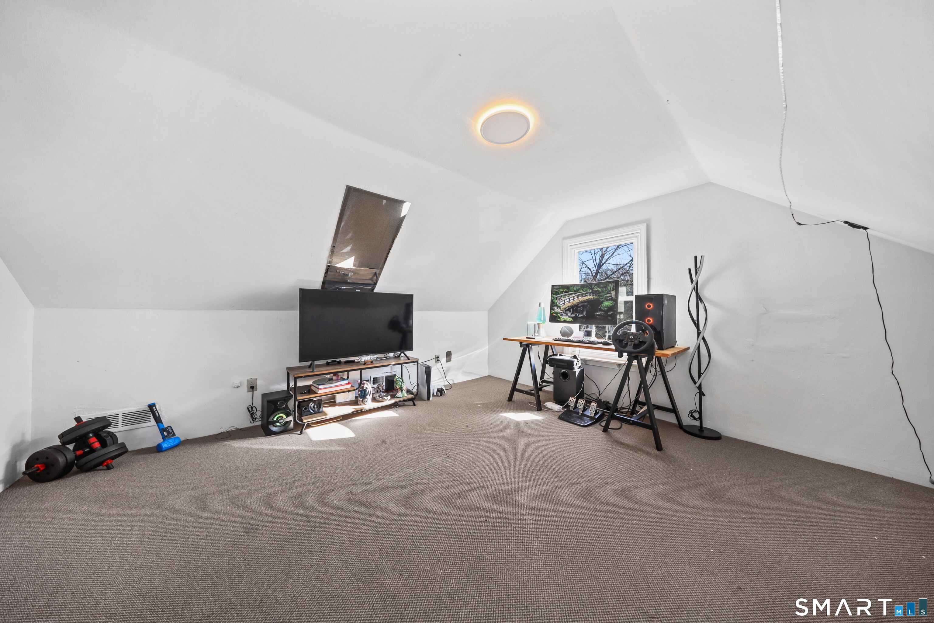 196 Waite Street Hamden, CT 06517 - Photo 9 of 15 a room with gym equipment and a view of living room