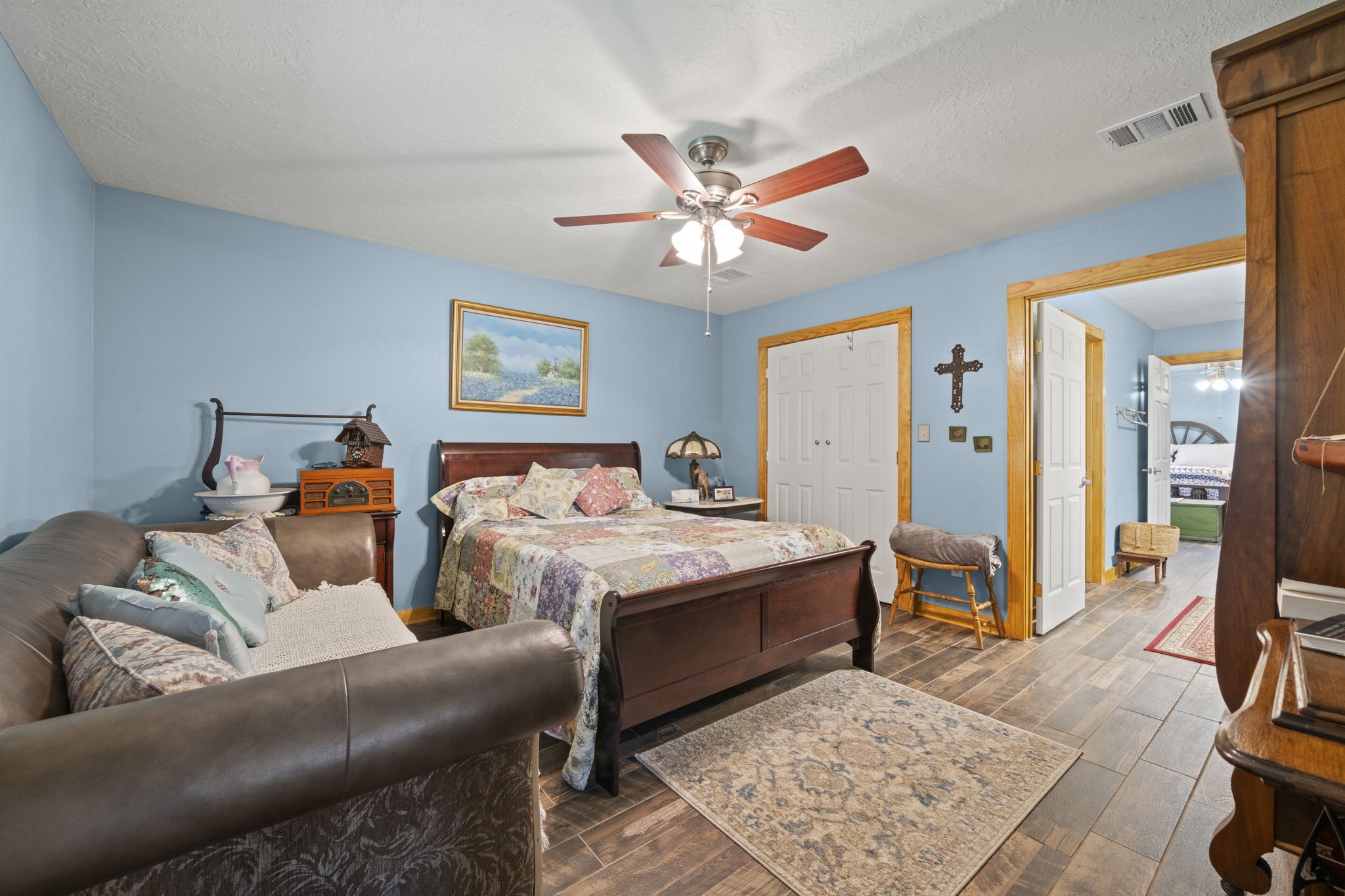 15610 Penick Road Waller, TX 77484 - Photo 36 of 49 a bedroom with furniture and a rug