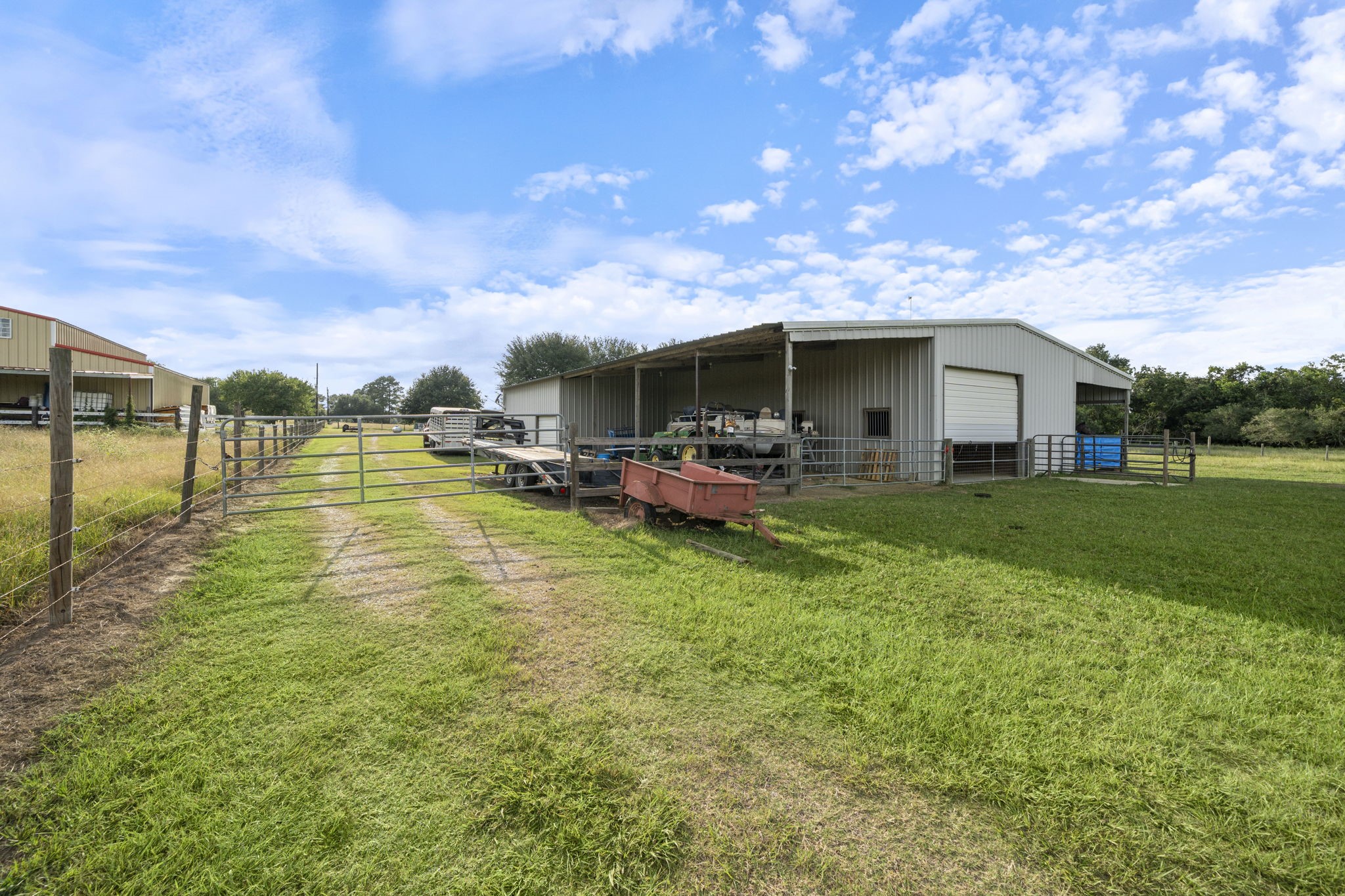 15610 Penick Road Waller, TX 77484 - Photo 48 of 49 a backyard of a house with table and chairs