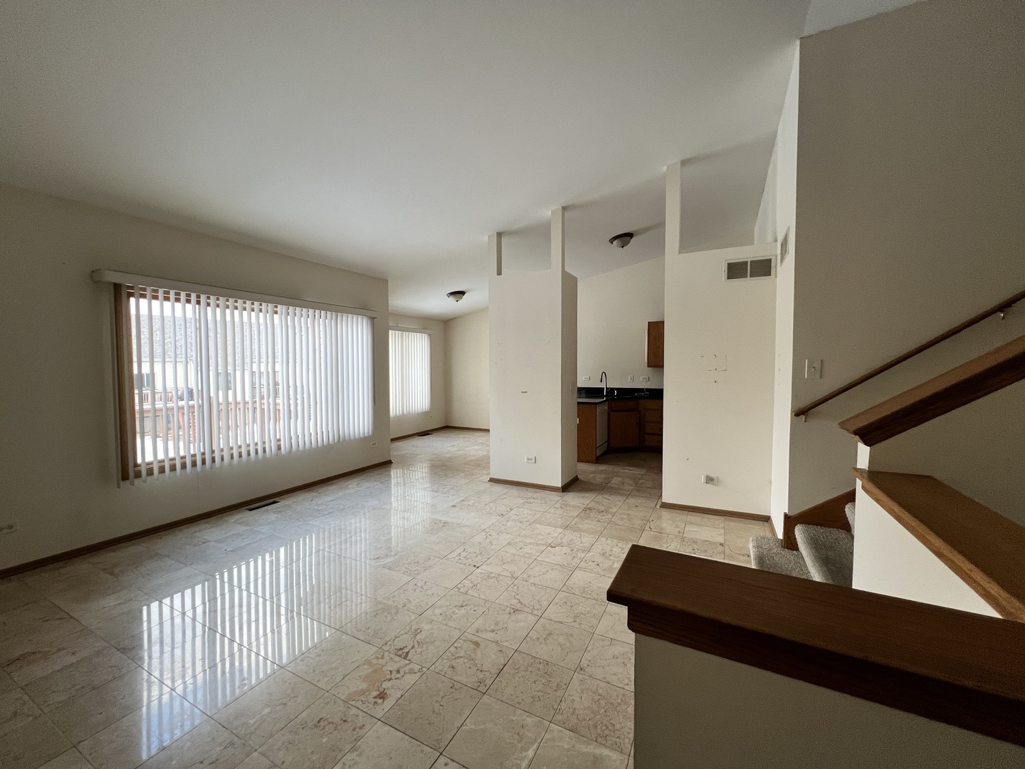 8256 Chestnut Court Frankfort, IL 60423 - Photo 3 of 22 a view of an empty room with a window