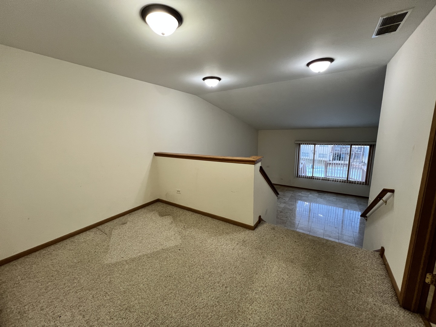 8256 Chestnut Court Frankfort, IL 60423 - Photo 8 of 22 a view of an empty room