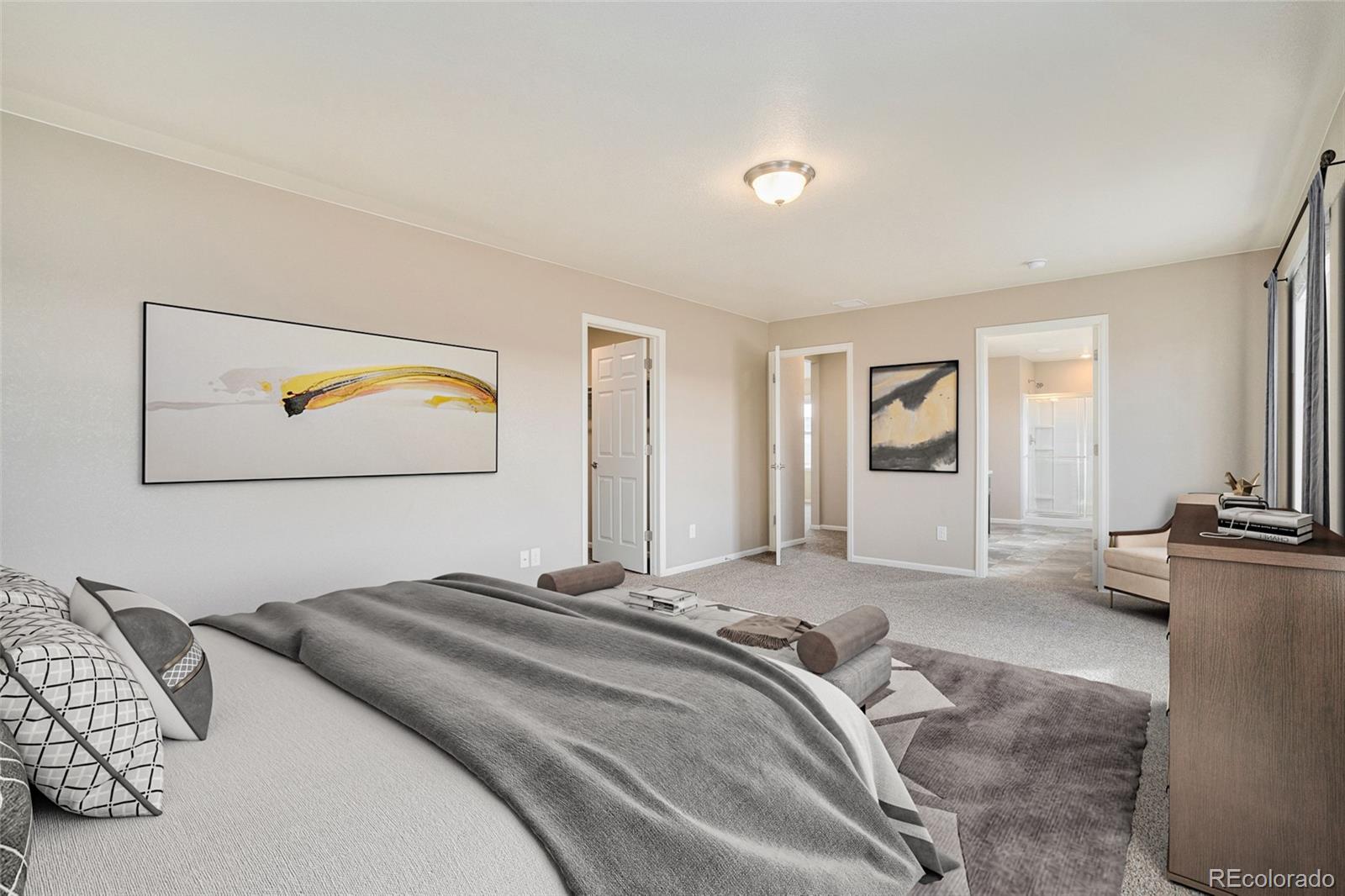 415 3rd Street Severance, CO 80550 - Photo 14 of 27 a bedroom with a bed and painting on the wall