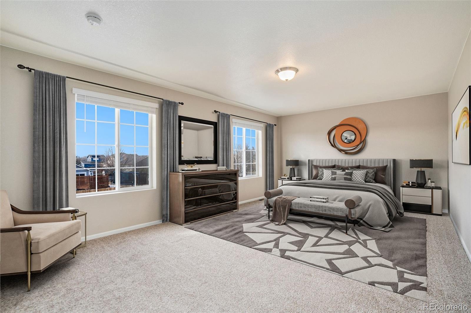 415 3rd Street Severance, CO 80550 - Photo 16 of 27 a spacious bedroom with a bed and furniture