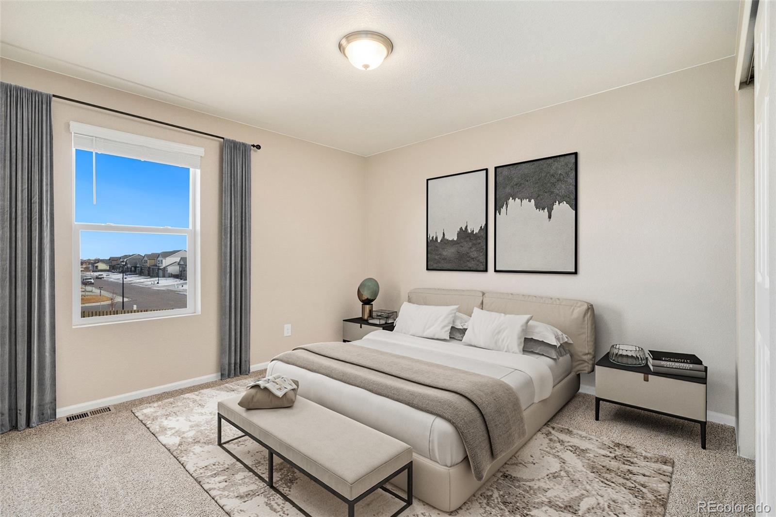 415 3rd Street Severance, CO 80550 - Photo 17 of 27 a bedroom with a bed and a painting on the wall
