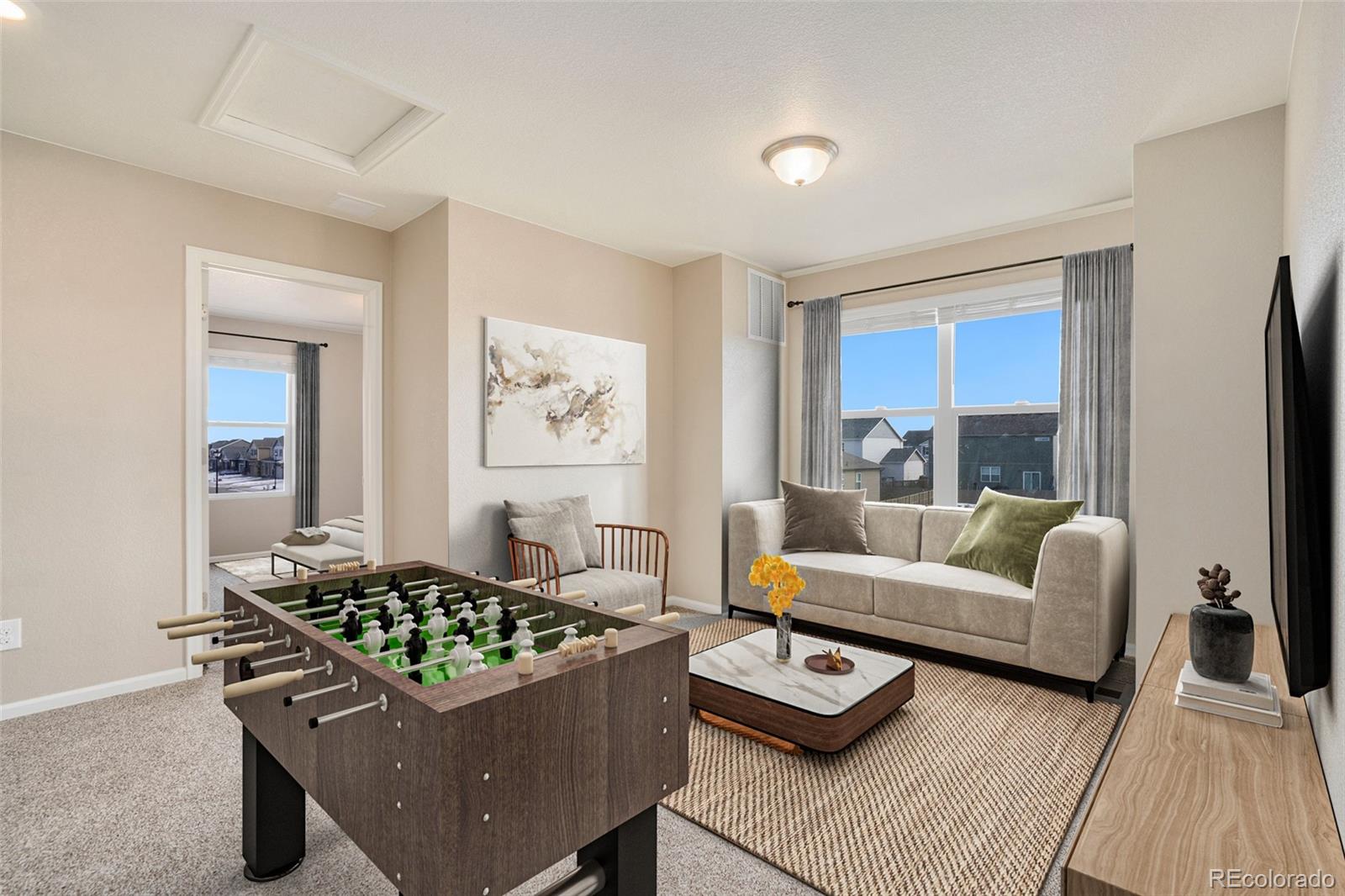 415 3rd Street Severance, CO 80550 - Photo 21 of 27 a living room with furniture and a couch