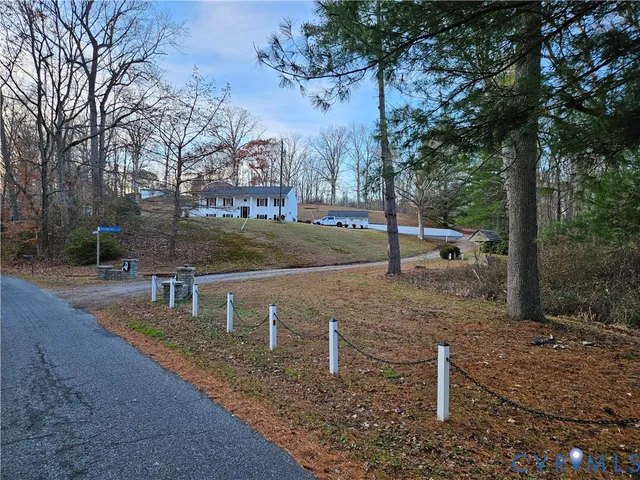 a view of a backyard of the house