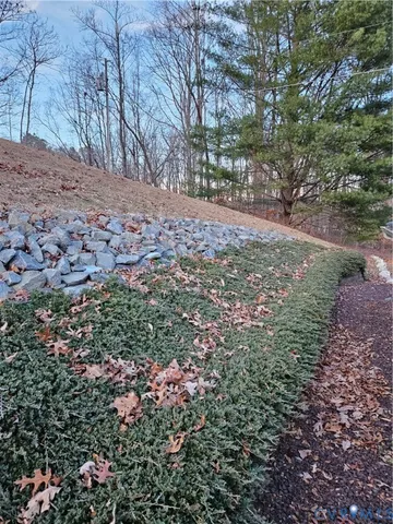 a bedroom with a bed and flat screen tv