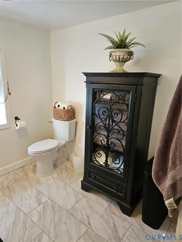 a bedroom with a bed and a cabinets