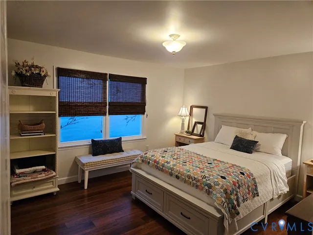 a bathroom with a sink vanity and mirror