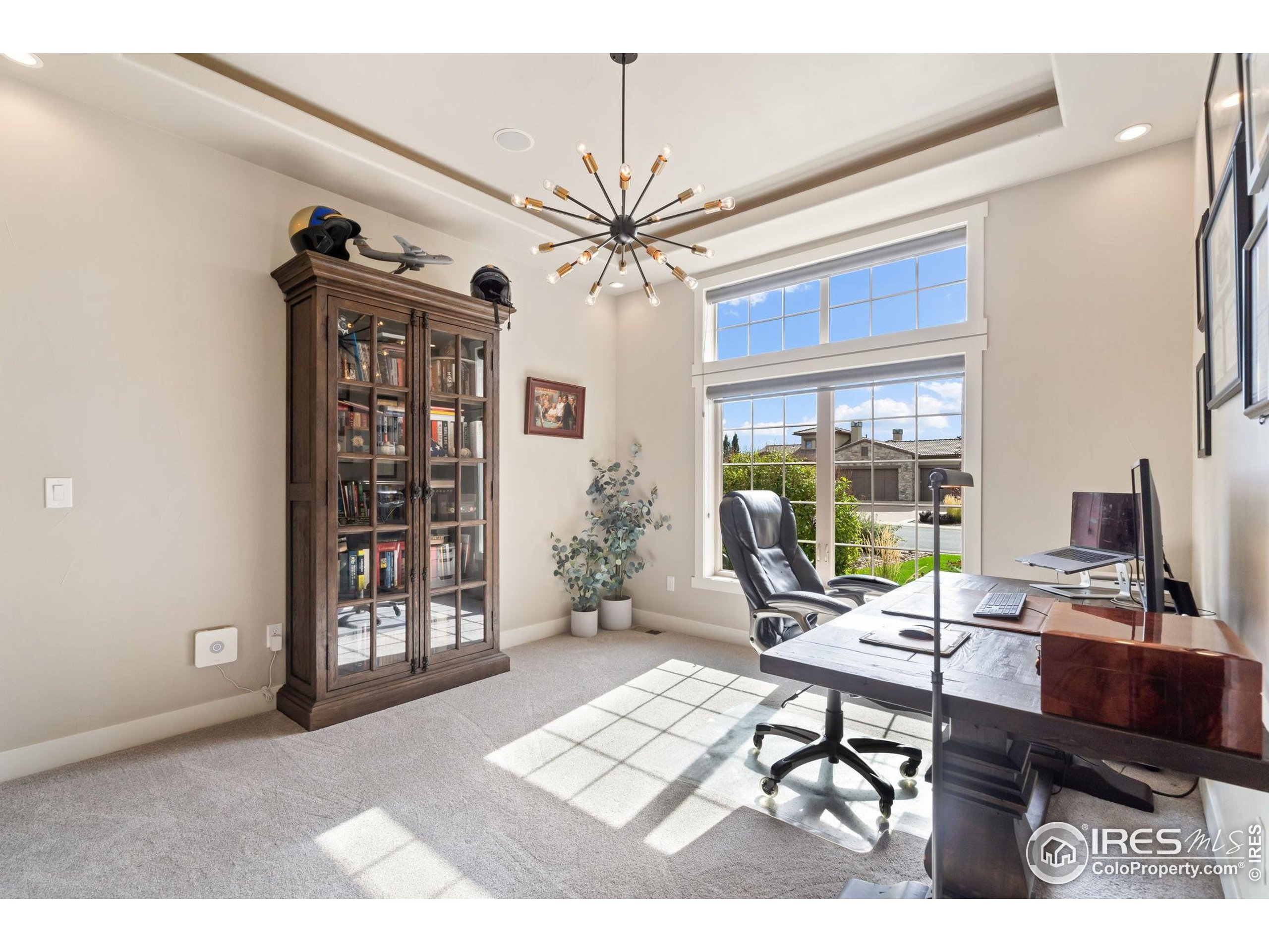 3828 Valley Crest Drive Timnath, CO 80547 - Photo 25 of 50 a workspace with furniture and a window