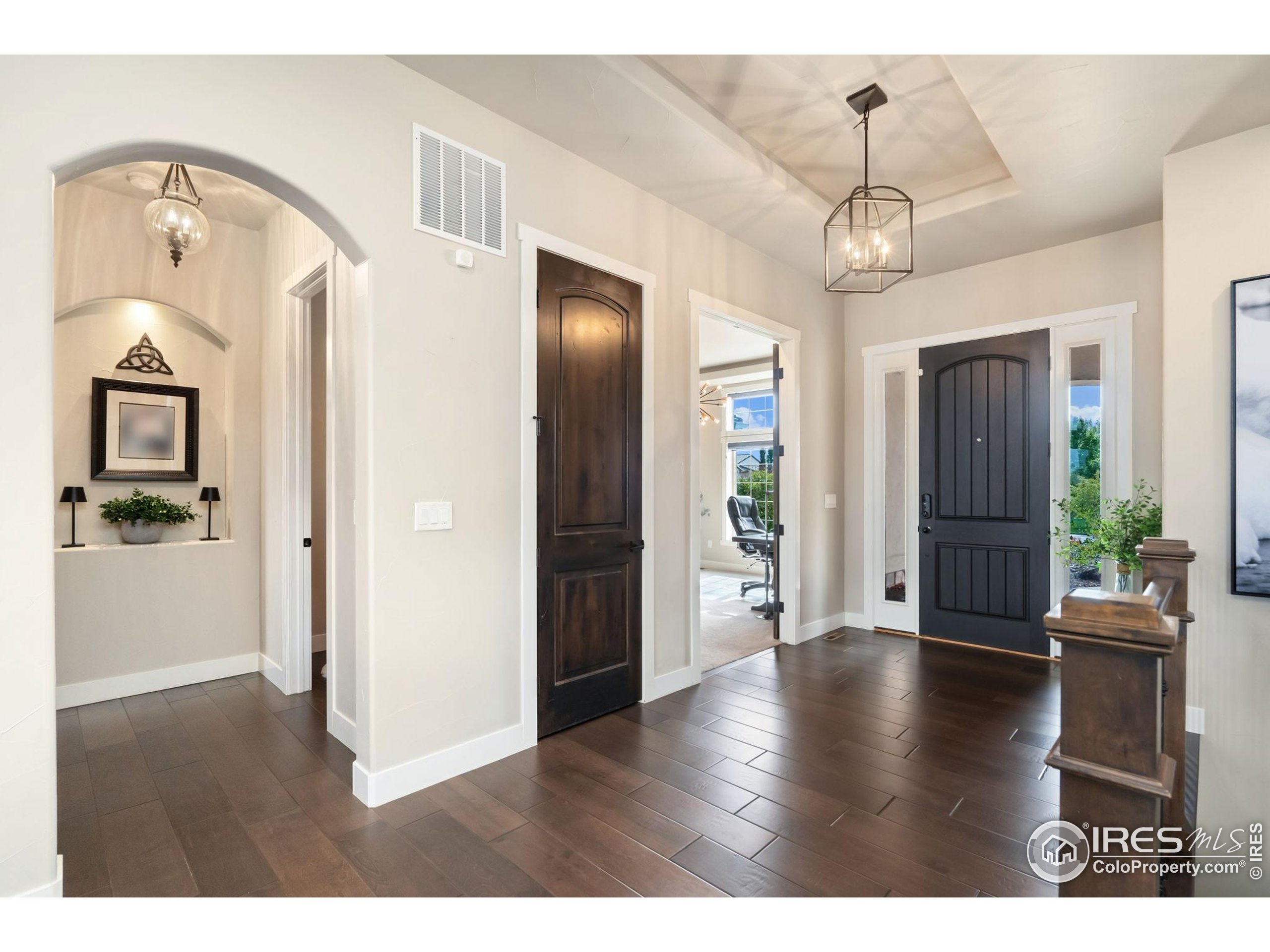 3828 Valley Crest Drive Timnath, CO 80547 - Photo 3 of 50 a view interior of a house with wooden floor