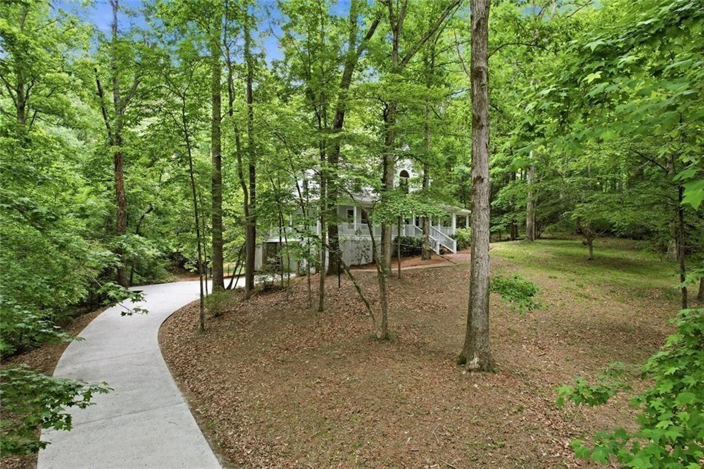 3259 Etchison Road Loganville, GA 30052 - Photo 4 of 50 a view of a yard with plants