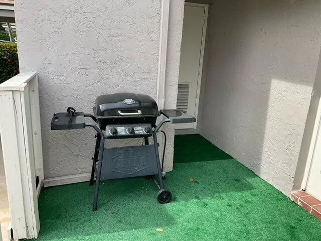 a view of backyard with trampoline