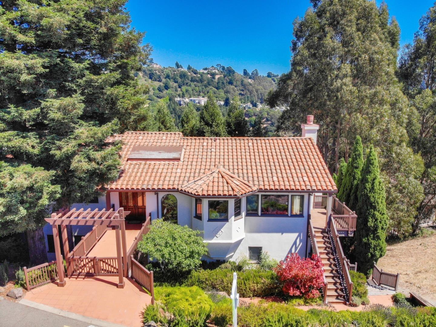 front view of a house with a garden