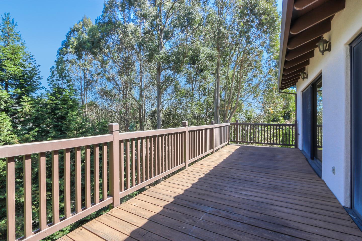 6840 Buckingham Boulevard Berkeley, CA 94705 - Photo 14 of 50 a view of balcony with wooden floor