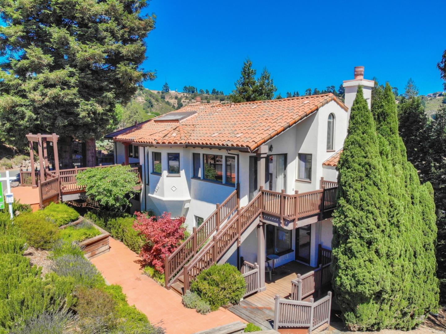 6840 Buckingham Boulevard Berkeley, CA 94705 - Photo 2 of 50 front view of a house with a yard