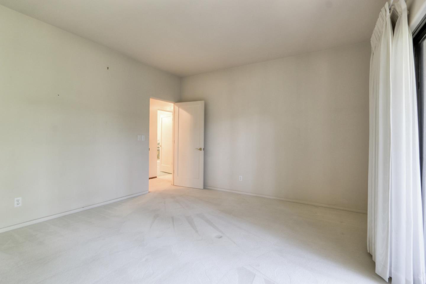 6840 Buckingham Boulevard Berkeley, CA 94705 - Photo 36 of 50 a view of an empty room and window