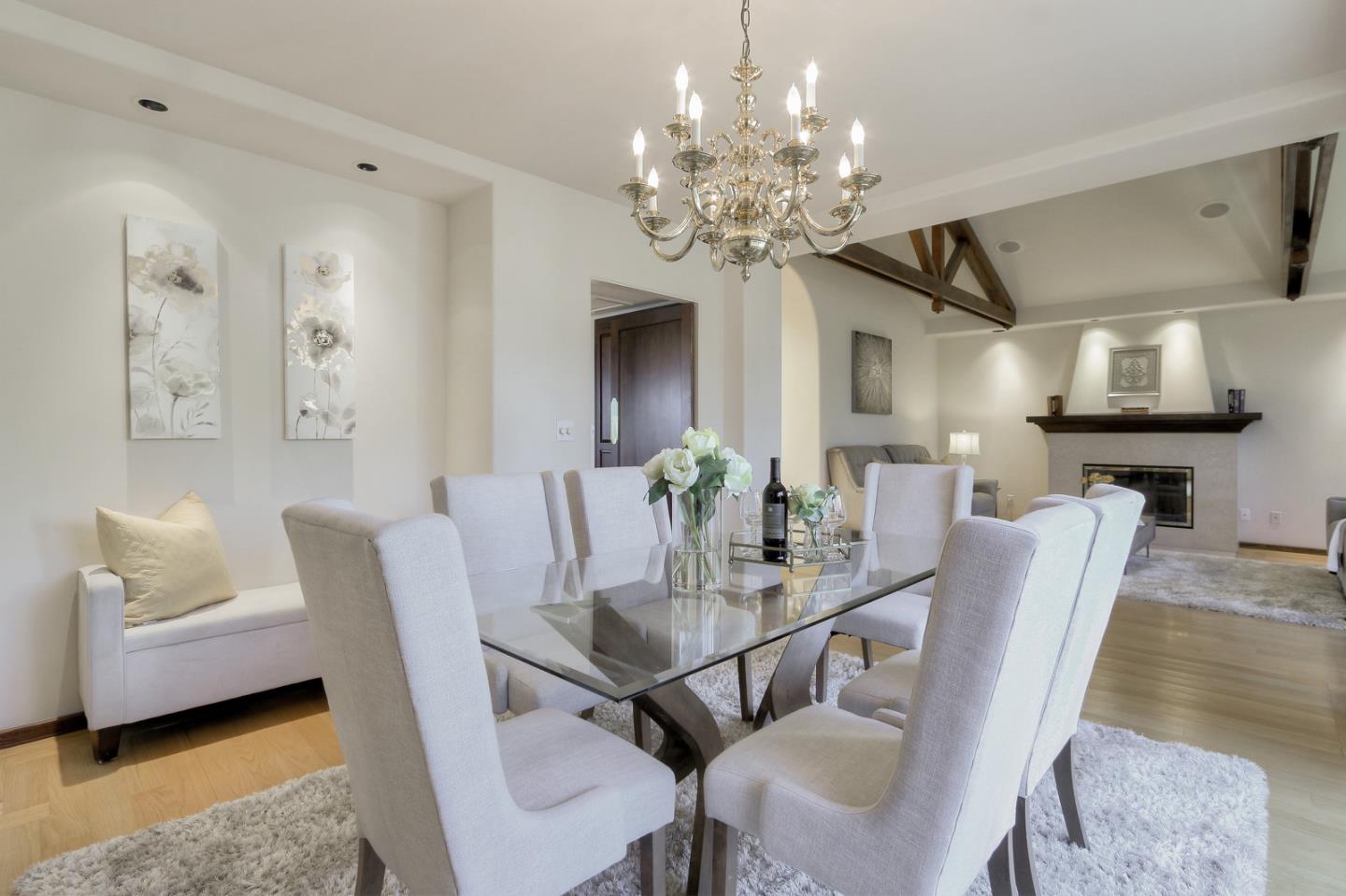 6840 Buckingham Boulevard Berkeley, CA 94705 - Photo 42 of 50 a view of a dining room with furniture and chandelier