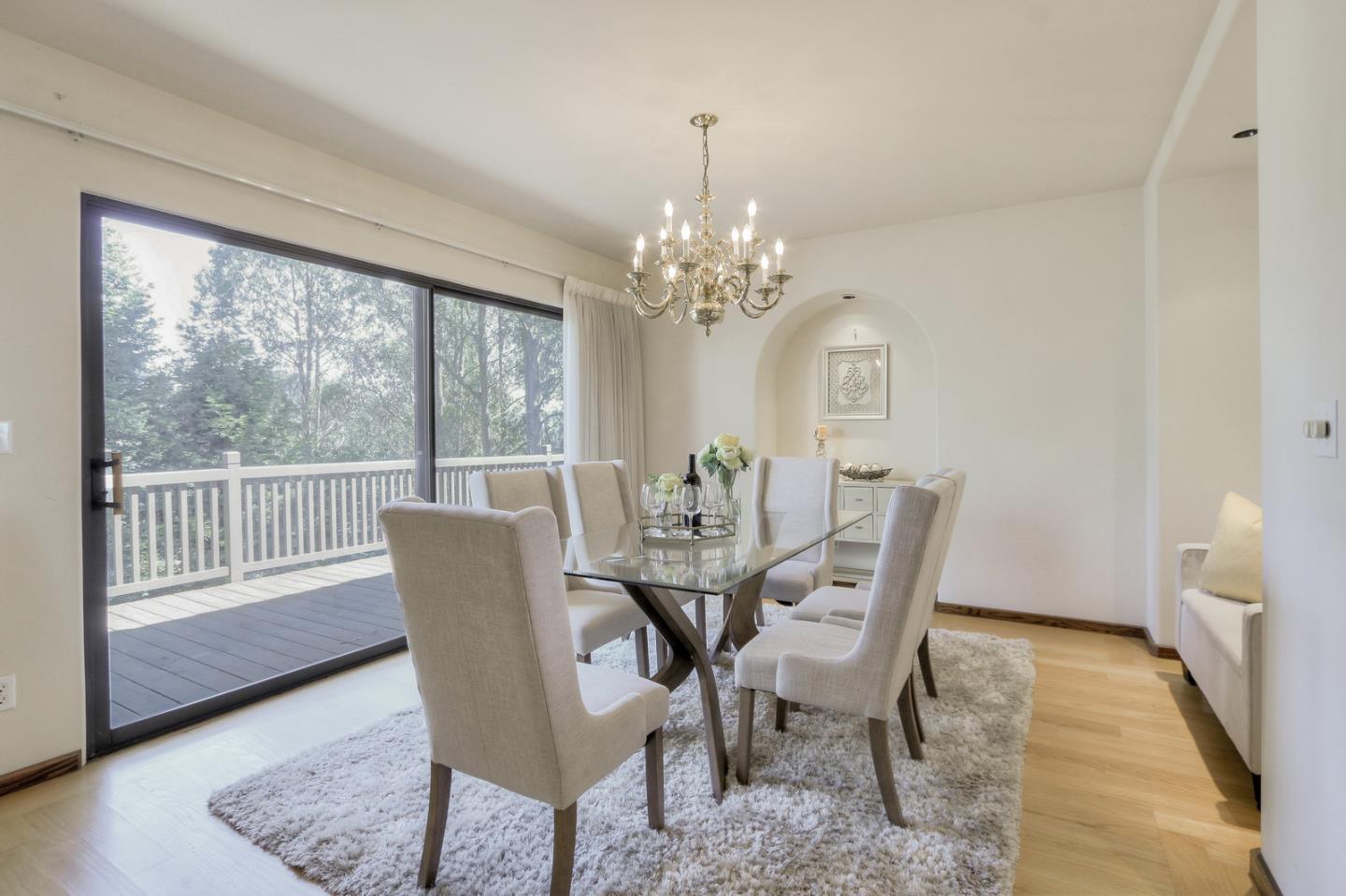 6840 Buckingham Boulevard Berkeley, CA 94705 - Photo 43 of 50 a view of a dining room with furniture window and wooden floor