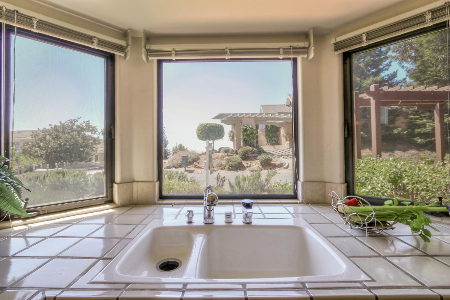 6840 Buckingham Boulevard Berkeley, CA 94705 - Photo 45 of 50 a view of a living room and a window