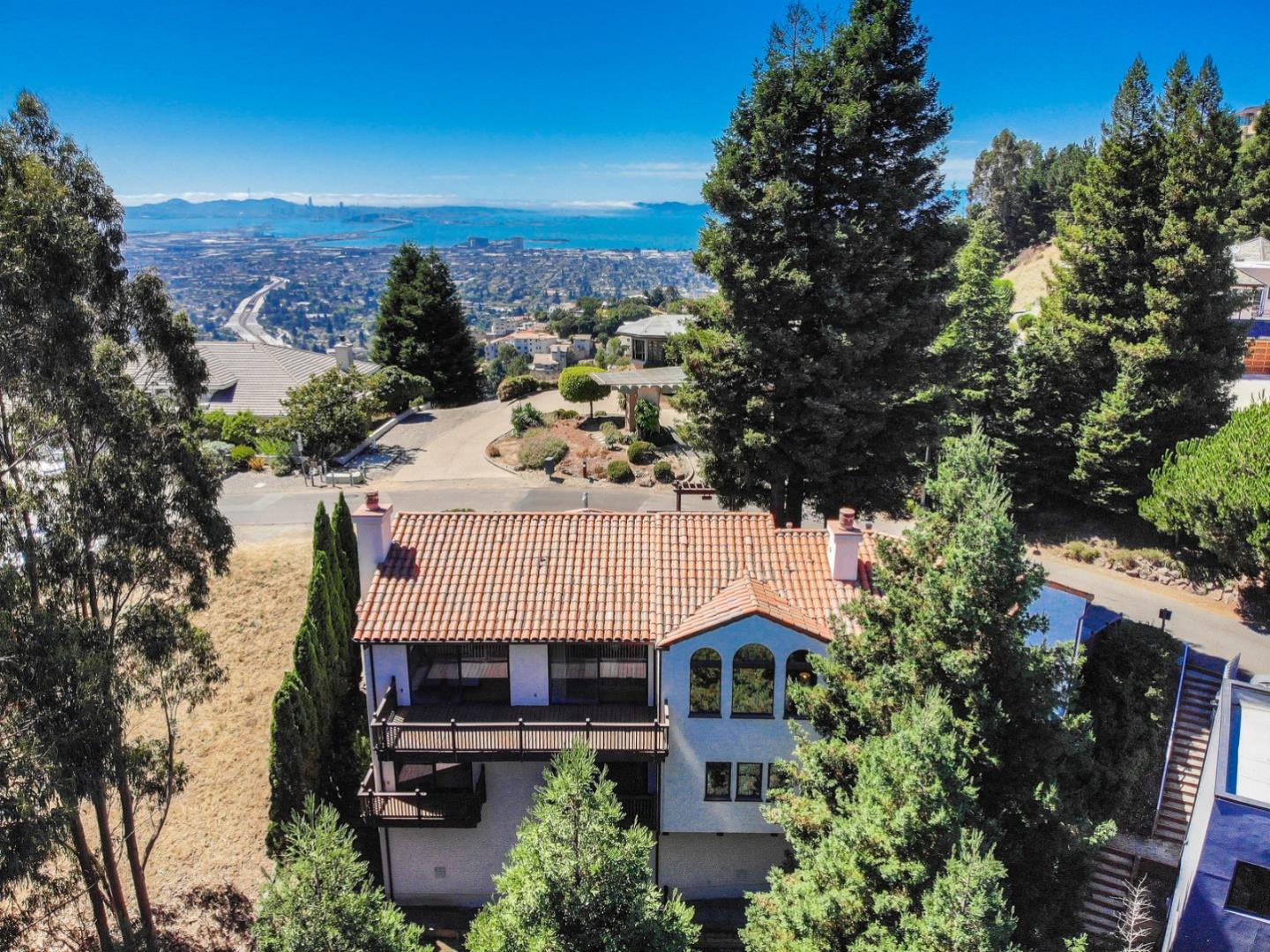 6840 Buckingham Boulevard Berkeley, CA 94705 - Photo 6 of 50 an outdoor view of a house with swimming pool