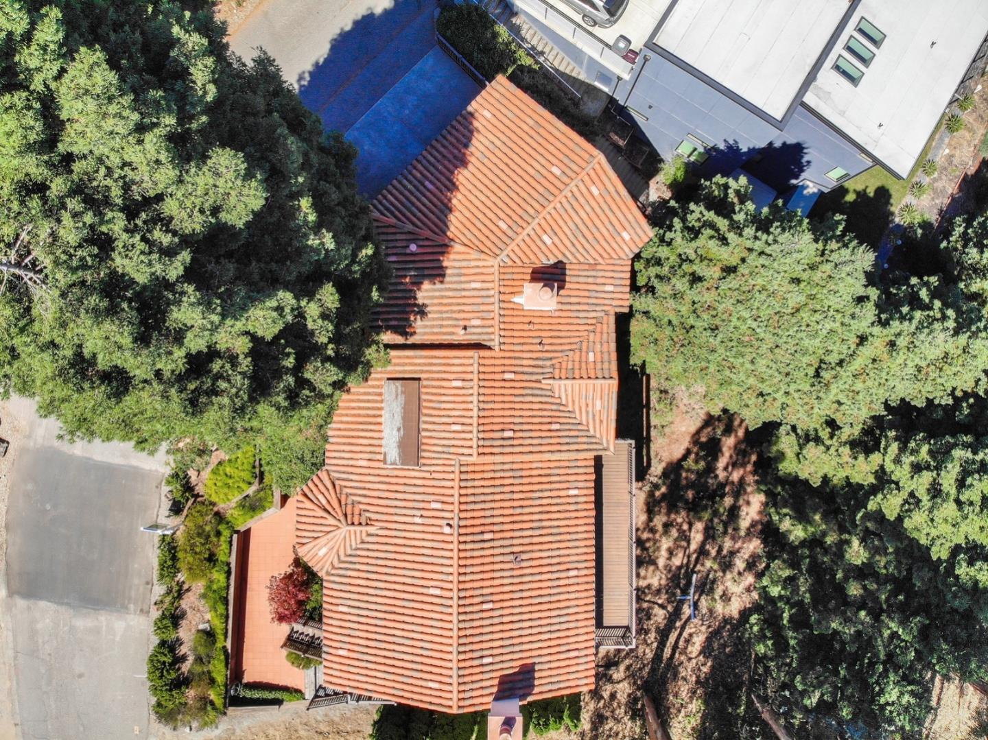 6840 Buckingham Boulevard Berkeley, CA 94705 - Photo 9 of 50 a view of a house with a yard and plant