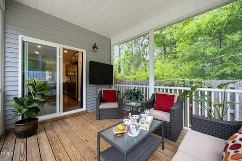 a outdoor living space with furniture and garden view