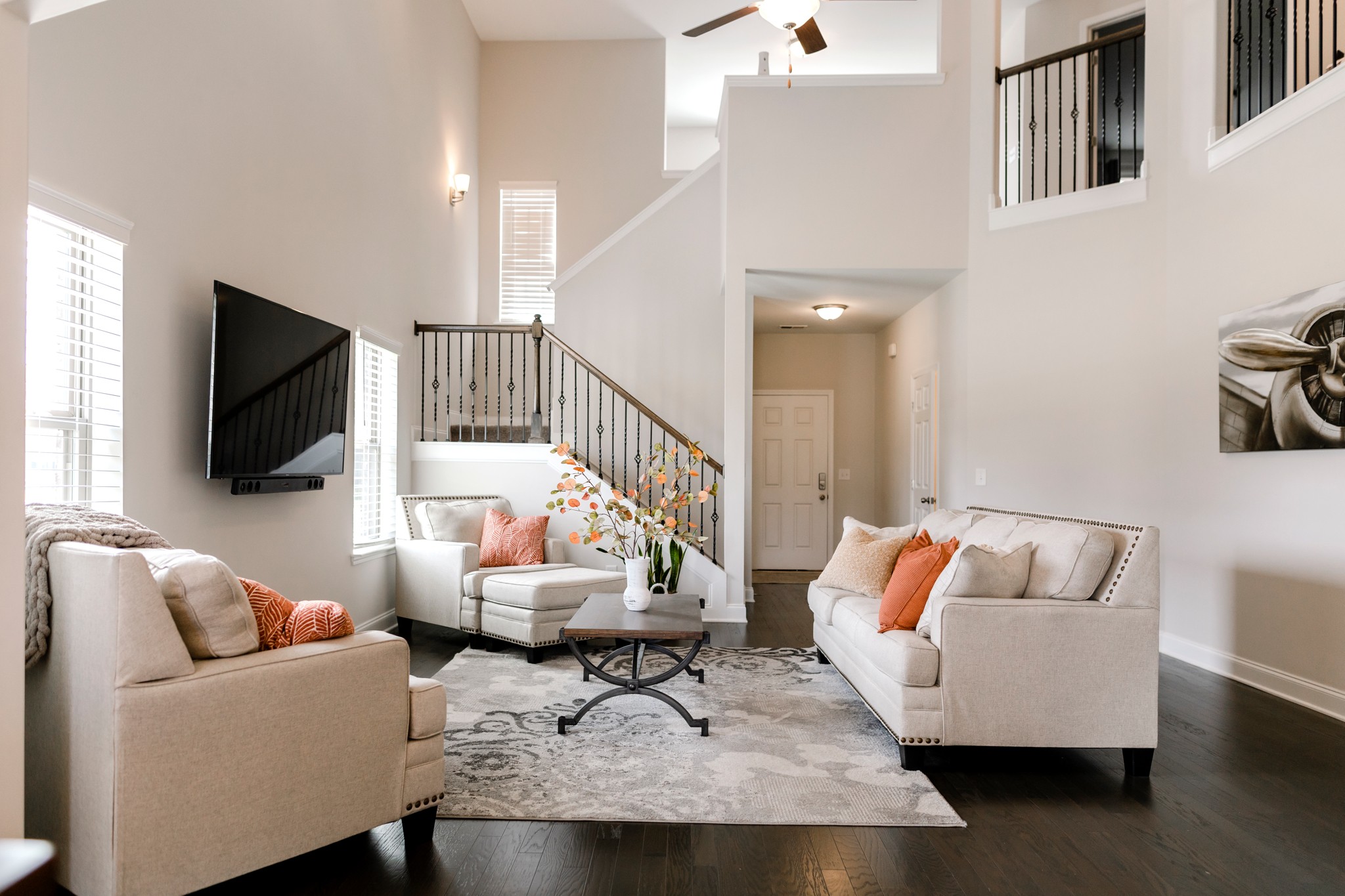 406 Quarry Road Gallatin, TN 37066 - Photo 3 of 9 a living room with furniture and a flat screen tv