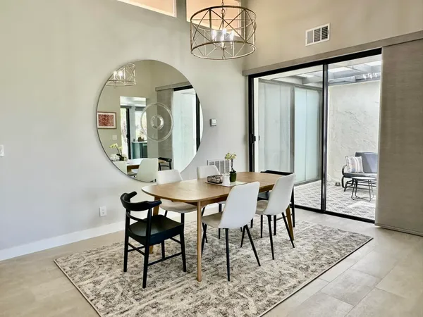 a view of a dining room with furniture