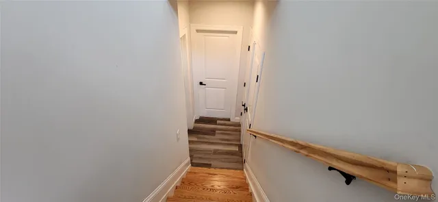 a bed room with a bed and a television