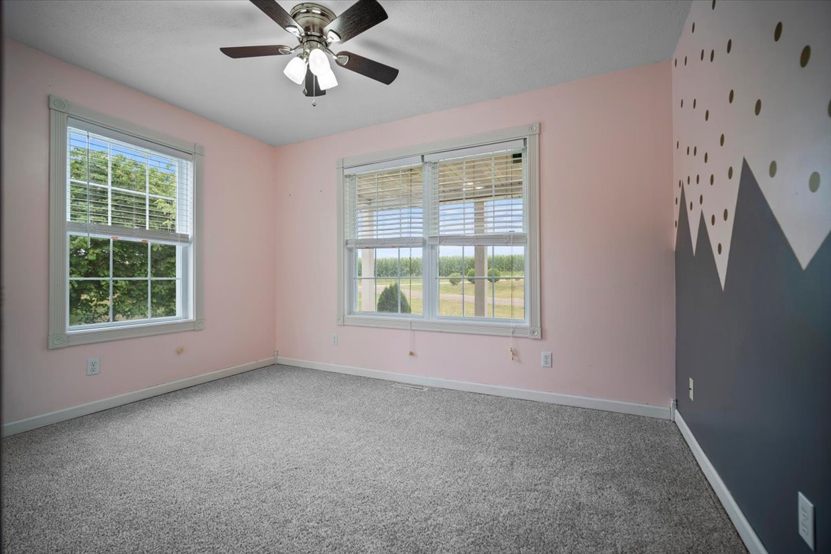 561 County Road 2000 East Secor, IL 61771 - Photo 16 of 31 a view of an empty room with a window