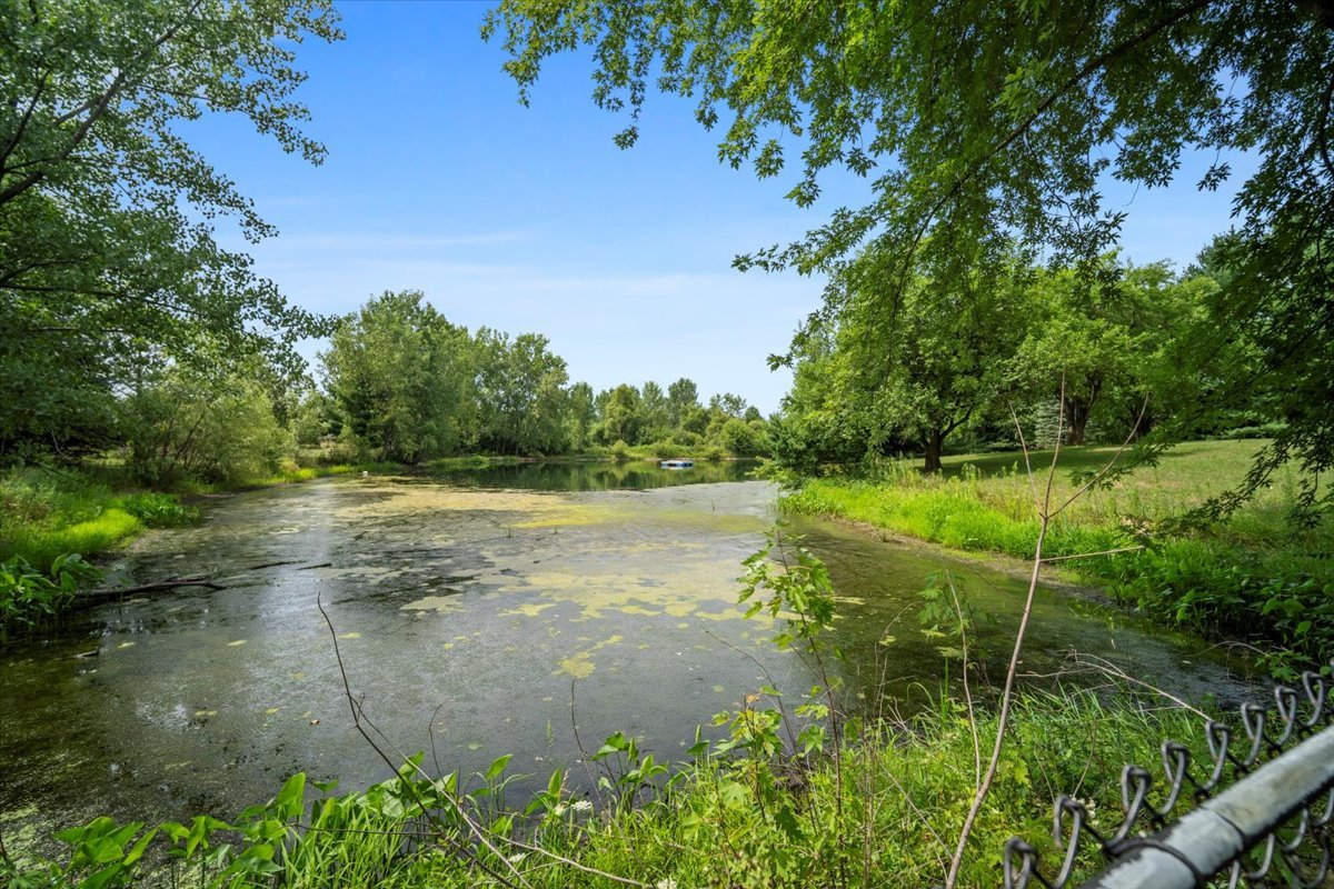 561 County Road 2000 East Secor, IL 61771 - Photo 23 of 31 a view of a lake with a big yard