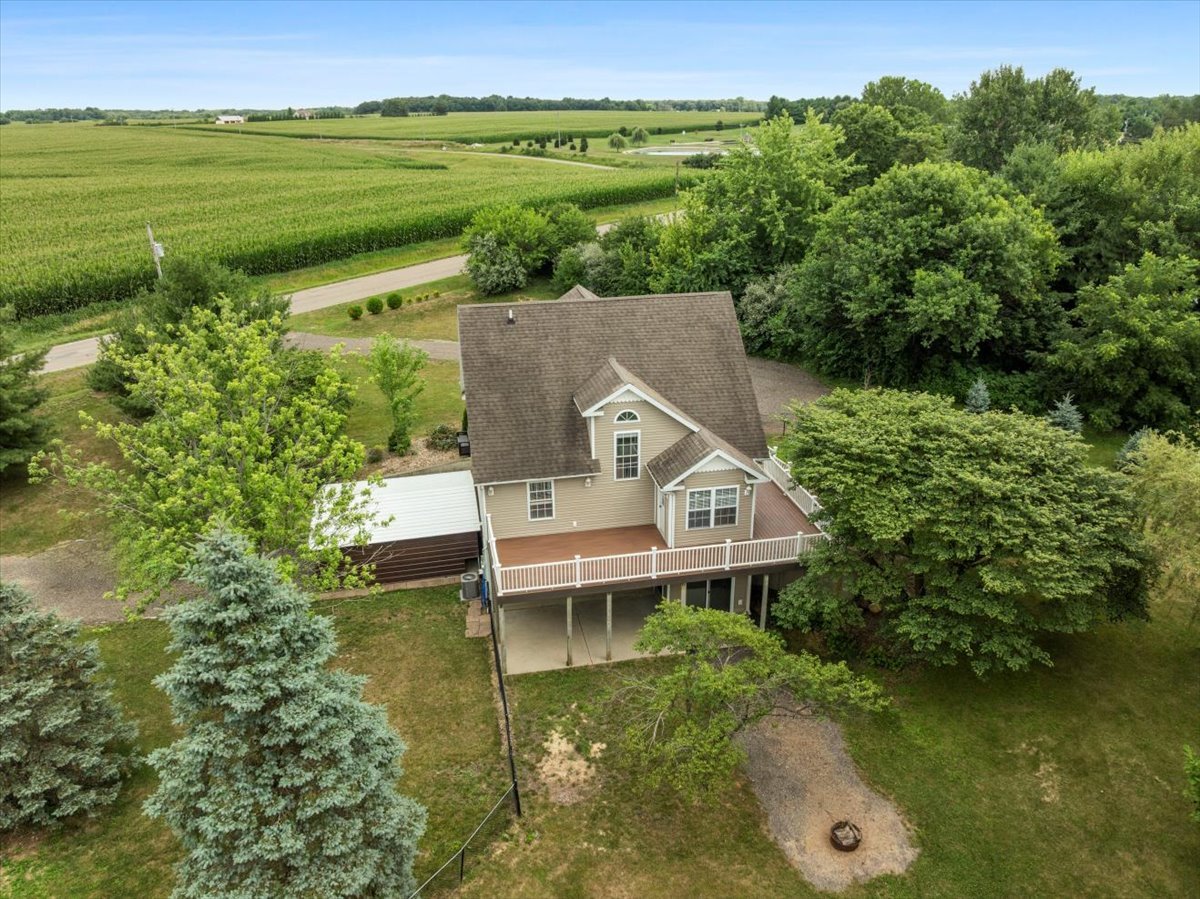 561 County Road 2000 East Secor, IL 61771 - Photo 28 of 31 an aerial view of a house with a garden