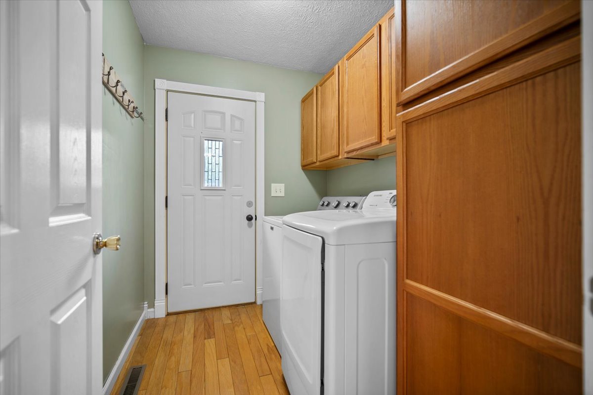 561 County Road 2000 East Secor, IL 61771 - Photo 5 of 31 a utility room with a sink washer and dryer
