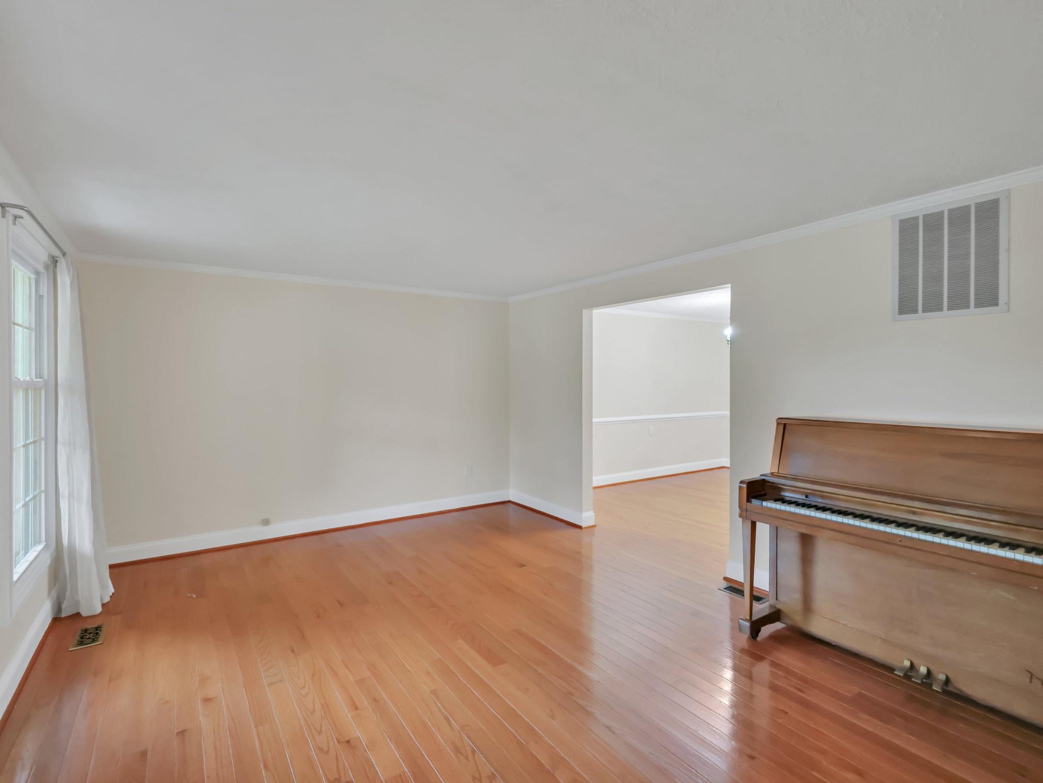 18 Windmill Court Silver Spring, MD 20905 - Photo 14 of 37 Spacious living room with warm wood floors.
