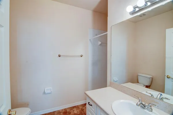 a bathroom with a sink and a toilet