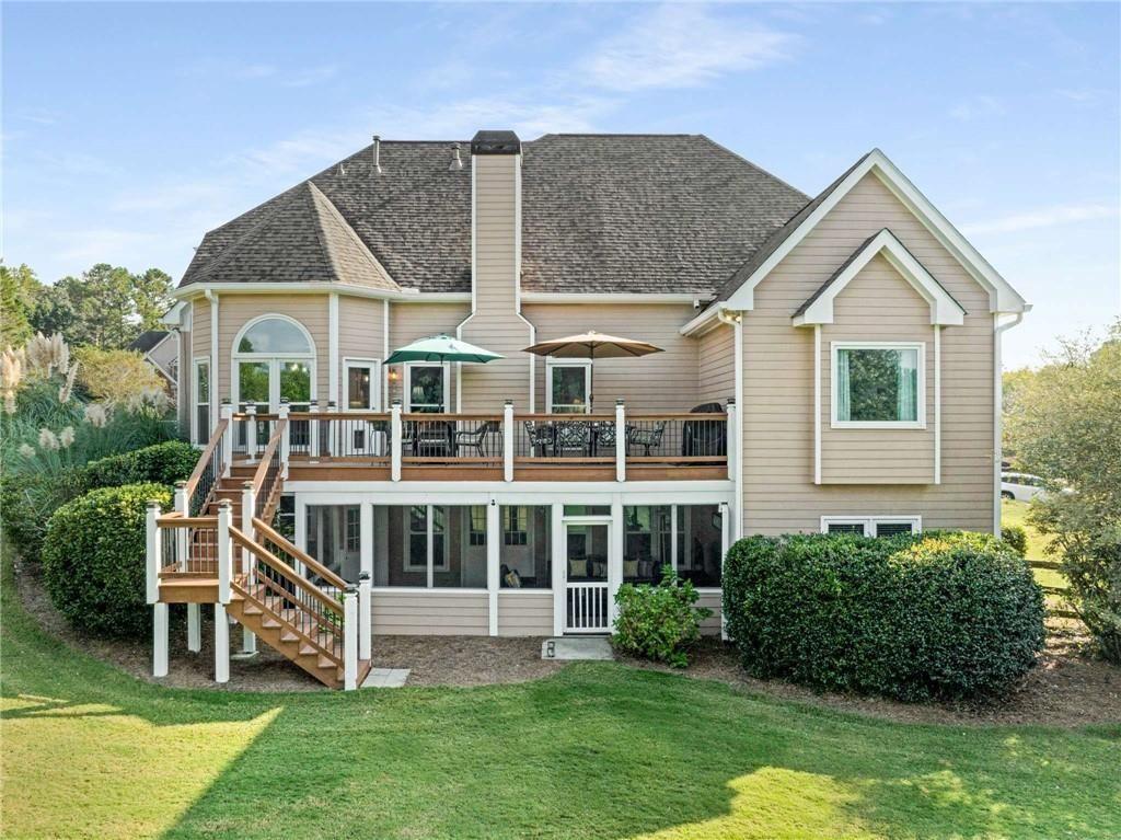 802 Clubhouse Pointe Woodstock, GA 30188 - Photo 1 of 66 a view of a house with a yard