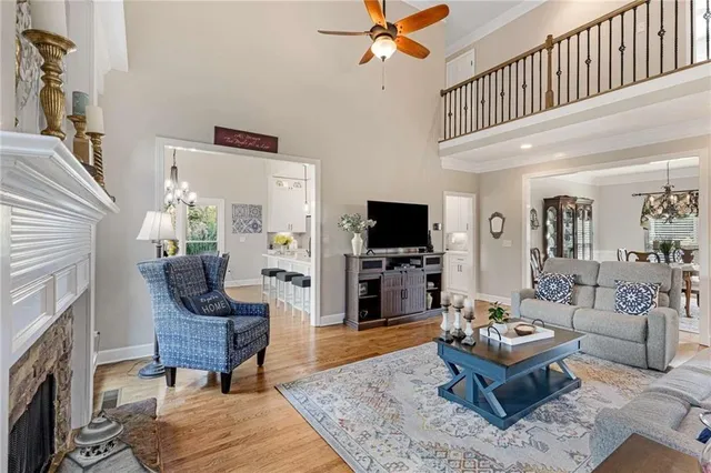 a living room with furniture window and book shelf
