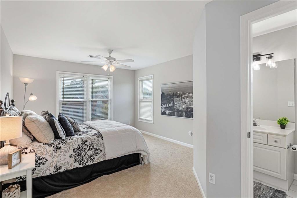 802 Clubhouse Pointe Woodstock, GA 30188 - Photo 35 of 66 a bedroom with a bed and a window with the outer view