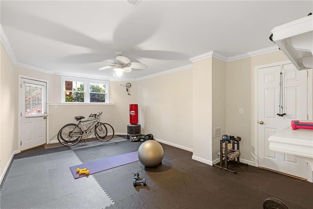 802 Clubhouse Pointe Woodstock, GA 30188 - Photo 53 of 66 a room with gym equipment and view of living room