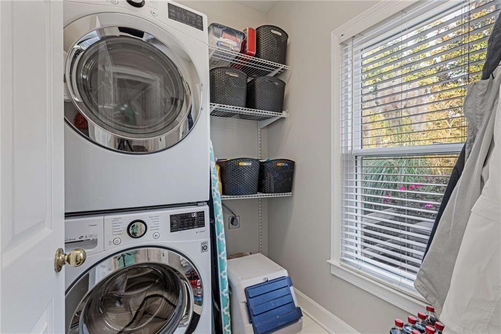 802 Clubhouse Pointe Woodstock, GA 30188 - Photo 54 of 66 a utility room with dryer and washer