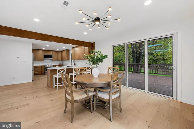 a kitchen with a sink a cabinets and window