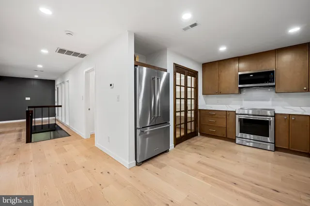 a view of an empty walk in closet