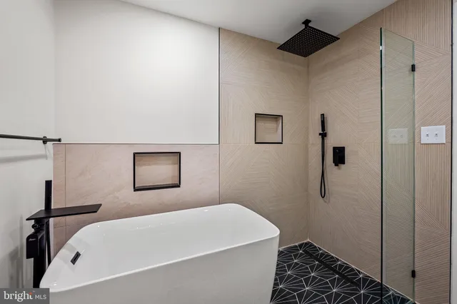 a bathroom with a sink vanity and a mirror