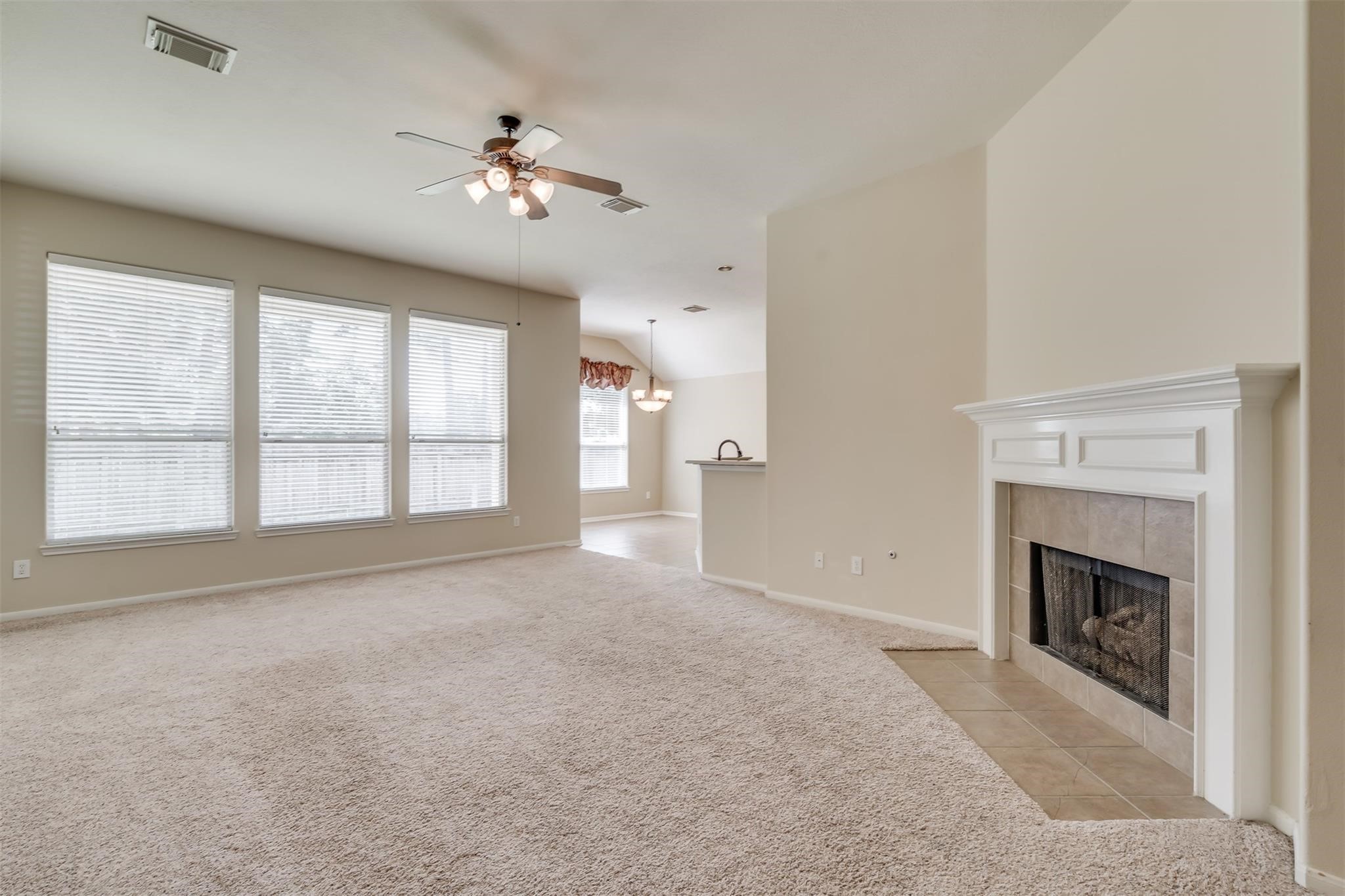 3419 La Fleur Lane Spring, TX 77388 - Photo 8 of 26 a view of an empty room with a fireplace and a window