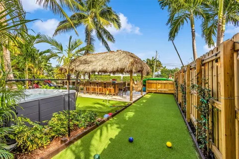 swimming pool view with a outdoor seating space